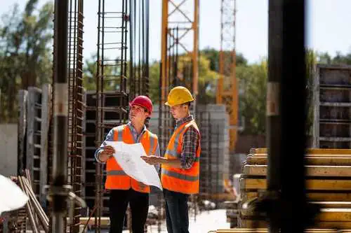 Construction contractor reviewing project-level margin and change order status